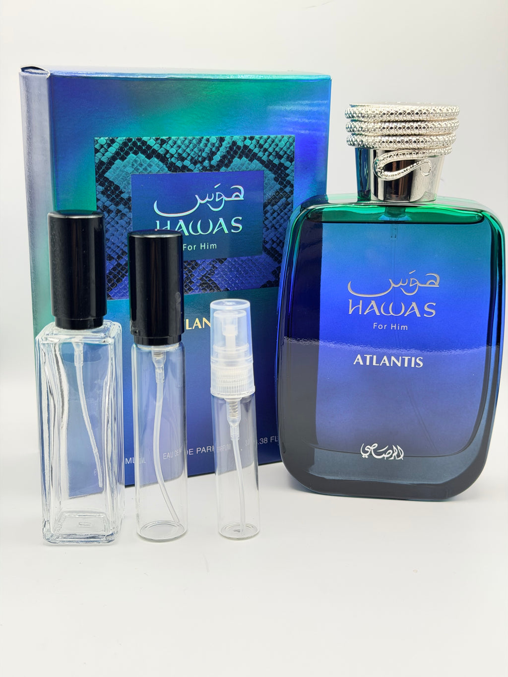Rasasi Hawas Atlantis For Him EDP deep blue bottle with silver serpent cap and decant vials